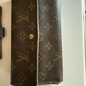 Louis Vuitton Brown and Gold Monogram wallet.